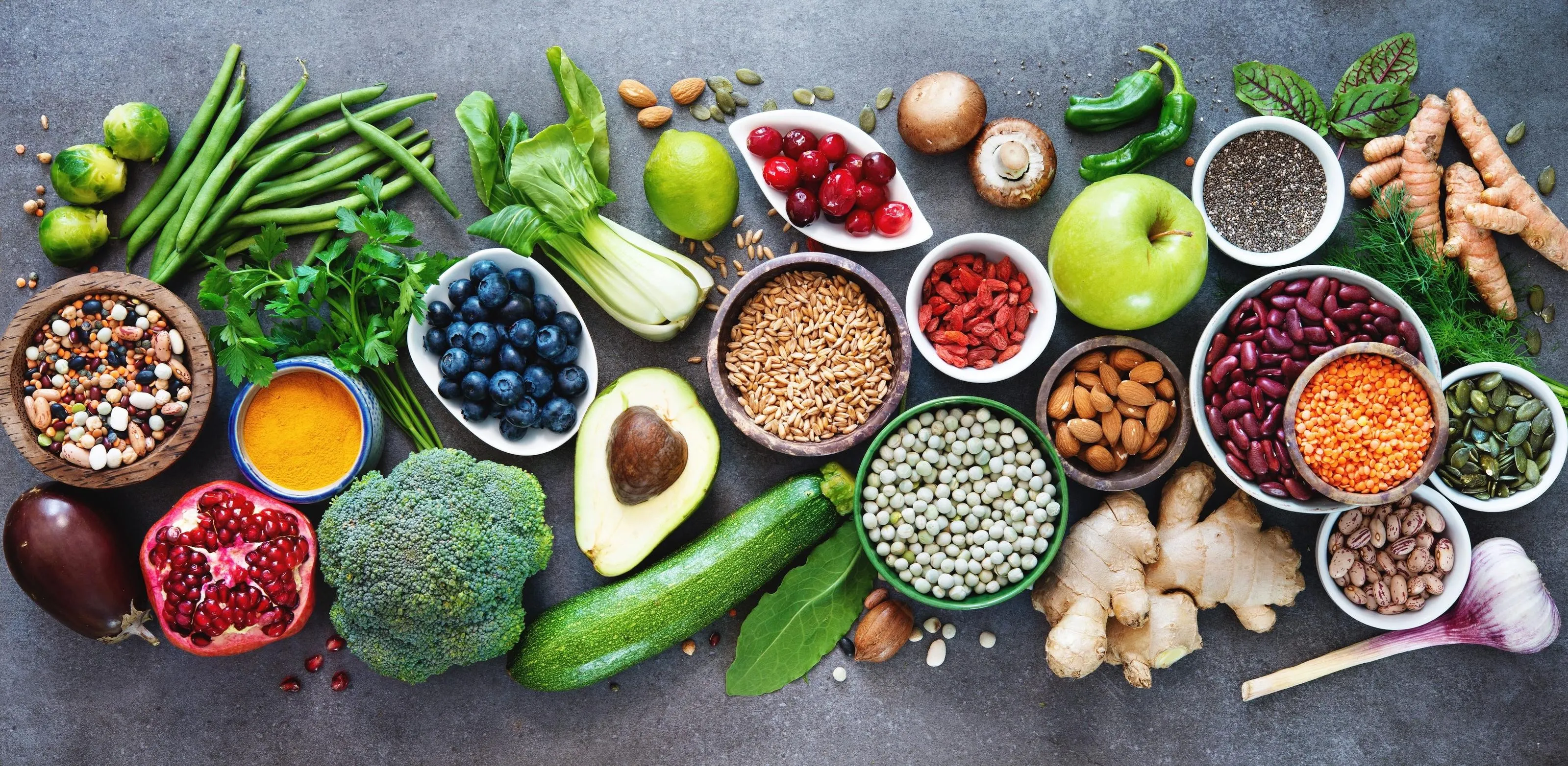 Colorful array of fresh fruits on a light background